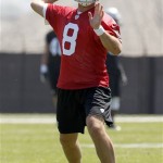 Oakland Raiders rookie quarterback Tyler Wilson throws a pass during NFL football rookie minicamp at the team's training facility in Alameda, Calif., Saturday, May 11, 2013. (AP Photo/Tony Avelar)
