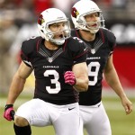 Arizona Cardinals kicker Jay Feely (3) and Dave Zastudil (9) react after Feely booted a game tying 61-yard field goal against the Buffalo Bills during the second half of an NFL football game on Sunday, Oct. 14, 2012, in Glendale, Ariz. (AP Photo/Matt York)