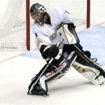 Anaheim Ducks goalie Jonas Hiller clears the puck against the Phoenix Coyotes during the second period of an NHL hockey game, Monday, March 4, 2013, in Glendale, Ariz. (AP Photo/Matt York)