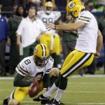 Green Bay Packers' Tim Masthay (8) holds while place kicker Mason Crosby makes a field goal against the Seattle Seahawks in the second half of an NFL football game, Monday, Sept. 24, 2012, in Seattle. (AP Photo/Stephen Brashear)