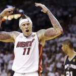 Miami Heat power forward Chris Andersen (11) gets the crowd to cheer against the San Antonio Spurs during the first half in Game 7 of the NBA basketball championships, Thursday, June 20, 2013, in Miami. (AP Photo/Lynne Sladky)