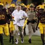  Arizona State head coach Todd Graham, center, leads his team out against Northern Arizona prior to their NCAA college football game on Thursday, Aug. 30 2012, in Tempe, Ariz. (AP Photo/Rick Scuteri)