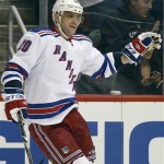 New York Rangers right-winger Marian Gaborik, of Slovakia, celebrates after scoring a goal against the Phoenix Coyotes in the first period of an NHL hockey game Saturday, Dec. 17, 2011 in Glendale, Ariz. (AP Photo/Paul Connors)