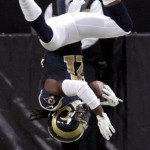  St. Louis Rams cornerback Janoris Jenkins leaps into the end zone after intercepting a pass and returning it 76-yards for a touchdown during the third quarter of a preseason NFL football game against the Baltimore Ravens Thursday, Aug. 30, 2012, in St. Louis. (AP Photo/Tom Gannam)