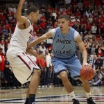  Rhode Island's Jarelle Reischel (2) drives to the lane pass Arizona's Brandon Ashley (21) in the first half of an NCAA college basketball game, Tuesday, Nov. 19, 2013 in Tucson, Ariz. This is in the second round of the NIT. (AP Photo/Wily Low)