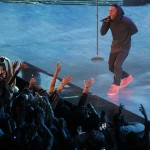  Singer Kendrick Lamar sings at a break during the skills competition at the NBA All Star basketball game, Saturday, Feb. 15, 2014, in New Orleans. (AP Photo/Bill Haber)