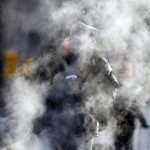 A person passes through vented steam while 
enduring freezing temperatures in Philadelphia, 
Tuesday, Dec. 14, 2010. (AP Photo)