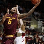 Arizona State forward Kyle Cain (5) is fouled by Stanford forward John Gage, back, as he scores in the second half of an NCAA college basketball game in Palo Alto, Calif., Thursday, Feb. 2, 2012. (AP Photo/Paul Sakuma)