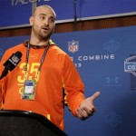 Oregon offensive lineman Kyle Long answers a question during a news conference at the NFL football scouting combine in Indianapolis, Thursday, Feb. 21, 2013. (AP Photo/Michael Conroy)
