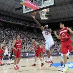 DeMarcus Cousins of the U.S, second right, vies for the ball over Mexico's Orlando Mendez, right, during Basketball World Cup Round of 16 match between United States and Mexico at the Palau Sant Jordi in Barcelona, Spain, Saturday, Sept. 6, 2014. The 2014 Basketball World Cup competition will take place in various cities in Spain from Aug. 30 through to Sept. 14. (AP Photo/Manu Fernandez)