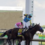 Victor Espinoza rides American Pharoah to victory in the 141st running of the Kentucky Derby horse race at Churchill Downs Saturday, May 2, 2015, in Louisville, Ky. (AP Photo/Brynn Anderson)