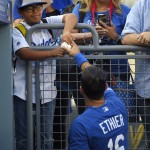 Los Angeles Dodgers' Andre Ethier signs autographs prior to the Dodgers' baseball game against the Arizona Diamondbacks, Wednesday, June 10, 2015, in Los Angeles. (AP Photo/Mark J. Terrill)