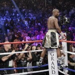 Floyd Mayweather Jr., reacts on his corner after the welterweight title fight against Manny Pacquiao, from the Philippines, on Saturday, May 2, 2015 in Las Vegas. (AP Photo/Isaac Brekken)
