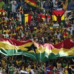 Fans from Ghana unfurl a banner in the stands before the group G World Cup soccer match between Ghana and the United States at the Arena das Dunas in Natal, Brazil, Monday, June 16, 2014. (AP Photo/Petr David Josek)