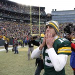 Green Bay Packers quarterback Aaron Rodgers blows a kiss to fans after an NFL divisional playoff football game against the Dallas Cowboys Sunday, Jan. 11, 2015, in Green Bay, Wis. The Packers won 26-21. (AP Photo/Matt Ludtke)
