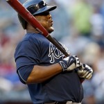 Atlanta Braves Juan Uribe reacts after getting called out on strikes in the first inning during a baseball game against the Arizona Diamondbacks, Tuesday, June 2, 2015, in Phoenix. (AP Photo/Rick Scuteri)