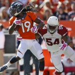 Denver Broncos wide receiver Isaiah Burse (19) is pursued by Arizona Cardinals inside linebacker Kenny Demens (54) during the first half of an NFL football game, Sunday, Oct. 5, 2014, in Denver. (AP Photo/Joe Mahoney)