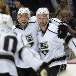  Los Angeles Kings defenseman Alec Martinez, center, celebrates his goal with left wing Tanner Pearson, left, and center Jeff Carter, right, during the first period in Game 2 of an NHL hockey second-round Stanley Cup playoff series against the Anaheim Ducks, Monday, May 5, 2014, in Anaheim, Calif. (AP Photo/Mark J. Terrill)