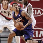  Phoenix Suns forward Gerald Green, front, maneuvers against Portland Trail Blazers guard Will Barton during the second half of an NBA basketball game in Portland, Ore., Friday, April 4, 2014. Green scored 32 points as the Suns defeated the Trail Blazers 109-93. (AP Photo/Don Ryan)