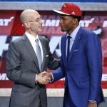 Justise Winslow, right is greeted by NBA commissioner Adam Silver after being selected 10th overall by the Miami Heat during the NBA basketball draft, Thursday, June 25, 2015, in New York. (AP Photo/Kathy Willens)
