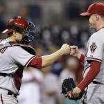 Arizona Diamondbacks catcher Miguel Montero, left celebrates with relief pitcher Brad Ziegler after the last out in a baseball game against the San Diego Padres on Thursday, Sept. 4, 2014, in San Diego. The Diamondbacks won 5-1. (AP Photo/Gregory Bull)