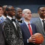 NBA commissioner Adam Silver, center, poses for a group photo with top NBA Draft prospects before the start of the 2014 NBA Draft, Thursday, June 26, 2014, in New York. (AP Photo/Jason DeCrow)