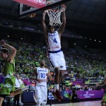 Dominican Republic's Edgar Sosa, center, dunks against Slovenia during Basketball World Cup Round of 16 match between Dominican Republic and Slovenia at the Palau Sant Jordi in Barcelona, Spain, Saturday, Sept. 6, 2014. The 2014 Basketball World Cup competition will take place in various cities in Spain from Aug. 30 through to Sept. 14. (AP Photo/Manu Fernandez)