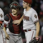  Arizona Diamondbacks closer Addison Reed, right, celebrates with catcher Miguel Montero after they defeated the Chicago White Sox 4-3 in an interleague baseball game in Chicago, Saturday, May 10, 2014. (AP Photo/Nam Y. Huh)
