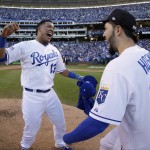 Kansas City Royals' Salvador Perez and Eric Hosmer celebrate after the Royals defeated the Baltimore Orioles 2-1 in Game 4 of the American League baseball championship series Wednesday, Oct. 15, 2014, in Kansas City, Mo. The Royals advance to the World Series. (AP Photo/Charlie Riedel)