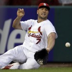 St. Louis Cardinals left fielder Matt Holliday cannot catch a ball hit by Arizona Diamondbacks' Tuffy Gosewisch for a single during the sixth inning of a baseball game Thursday, May 22, 2014, in St. Louis. (AP Photo/Jeff Roberson)
