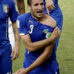 Italy's Giorgio Chiellini displays his shoulder during the group D World Cup soccer match between Italy and Uruguay at the Arena das Dunas in Natal, Brazil, Tuesday, June 24, 2014. (AP Photo/Hassan Ammar)
