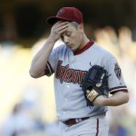 Arizona Diamondbacks starting pitcher Jeremy Hellickson reacts after giving up a home run to Los Angeles Dodgers Justin Turner during the first inning of a baseball game, Saturday, May 2, 2015, in Los Angeles. (AP Photo/Danny Moloshok)