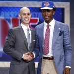 Stanley Johnson, right, poses for photos with NBA Commissioner Adam Silver after being selected eighth overall by the Detroit Pistons during the NBA basketball draft, Thursday, June 25, 2015, in New York. (AP Photo/Kathy Willens)
