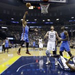  Oklahoma City Thunder guard Russell Westbrook (0) shoots as Memphis Grizzlies guard Mike Conley falls to the floor in the first half of Game 6 of an opening-round NBA basketball playoff series Thursday, May 1, 2014, in Memphis, Tenn. (AP Photo/Mark Humphrey)