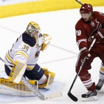 Buffalo Sabres' Anders Lindback (35), of Sweden, makes save on a shot by Arizona Coyotes' Shane Doan (19) during the second period of an NHL hockey game Monday, March 30, 2015, in Glendale, Ariz. (AP Photo/Ross D. Franklin)