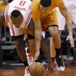 Houston Rockets' Joey Dorsey (8) and Phoenix Suns' Gerald Green reach for the ball during the first half of an NBA basketball game Friday, Jan. 23, 2015, in Phoenix. (AP Photo/Ross D. Franklin)