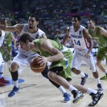 Dominican Republic's Ronald Ramon, left, vies for the ball against Slovenia's Goran Dragic during Basketball World Cup Round of 16 match between Dominican Republic and Slovenia at the Palau Sant Jordi in Barcelona, Spain, Saturday, Sept. 6, 2014. The 2014 Basketball World Cup competition will take place in various cities in Spain from Aug. 30 through to Sept. 14. (AP Photo/Manu Fernandez)