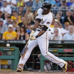 Pittsburgh Pirates' Gregory Polanco (25) hits a two-run home run off Arizona Diamondbacks starting pitcher Chase Anderson during the second inning of a baseball game in Pittsburgh, Wednesday, July 2, 2014. (AP Photo/Gene J. Puskar)
