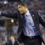Connecticut head coach Kevin Ollie directs action against Kentucky during the first half of the NCAA Final Four tournament college basketball championship game Monday, April 7, 2014, in Arlington, Texas. (AP Photo/Eric Gay)