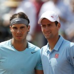 Serbia's Novak Djokovic, right, and Spain's Rafael Nadal pose before the final match of the French Open tennis tournament at the Roland Garros stadium, in Paris, France, Sunday, June 8, 2014. (AP Photo/Darko Vojinovic)