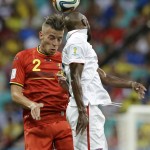 United States' DaMarcus Beasley, right, and Belgium's Toby Alderweireld battle for a high ball during the World Cup round of 16 soccer match between Belgium and the USA at the Arena Fonte Nova in Salvador, Brazil, Tuesday, July 1, 2014. (AP Photo/Matt Dunham)