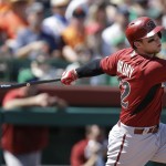 Arizona Diamondbacks' Brandon Drury swings for a two run double off San Francisco Giants' Curtis Partch in the third inning of a spring training exhibition baseball game Tuesday, March 17, 2015, in Scottsdale, Ariz. (AP Photo/Ben Margot)