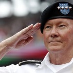 Gen. Martin Dempsey, Chairman of the Joint Chiefs of Staff, salutes during the national anthem while on the field for pre-game ceremonies before a baseball game between the Washington Nationals and the San Francisco Giants at Nationals Park, Saturday, July 4, 2015, in Washington. (AP Photo/Alex Brandon)
