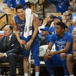 Kentucky's Devin Booker, second from left, laughs as he stands near teammates Aaron Harrison, right, and Marcus Lee in the closing minute of an NCAA college basketball game against Missouri on Thursday, Jan. 29, 2015, in Columbia, Mo. Kentucky won 69-53. (AP Photo/L.G. Patterson)