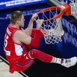 Serbia's Vladimir Stimac scores during the final World Basketball match between the United States and Serbia at the Palacio de los Deportes stadium in Madrid, Spain, Sunday, Sept. 14, 2014. (AP Photo/Manu Fernandez)