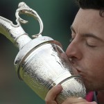 Rory McIlroy of Northern Ireland kisses the Claret Jug trophy after winning the British Open Golf championship at the Royal Liverpool golf club, Hoylake, England, Sunday July 20, 2014. (AP Photo/Peter Morrison)