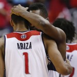  Washington Wizards forwards Trevor Ariza (1) and Martell Webster (9) hug after Game 6 of an Eastern Conference semifinal NBA basketball playoff series in Washington, Thursday, May 15, 2014. The Indiana Pacers defeated the Wizards 93-80 to advance to the Eastern Conference finals. (AP Photo/Alex Brandon)