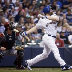 Milwaukee Brewers' Adam Lind hits a two-run home run during the third inning of a baseball game against the Arizona Diamondbacks on Friday, May 29, 2015, in Milwaukee. (AP Photo/Morry Gash)