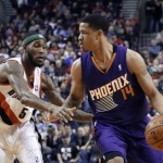 Phoenix Suns forward Gerald Green, right, dribbles against Portland Trail Blazers guard Will Barton during the first half of an NBA basketball game in Portland, Ore., Friday, April 4, 2014. (AP Photo/Don Ryan)