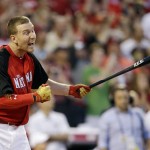 National League's Todd Frazier, of the Cincinnati Reds, reacts after hitting is 14th home run during the MLB All-Star baseball Home Run Derby, Monday, July 13, 2015, in Cincinnati. (AP Photo/Jeff Roberson)